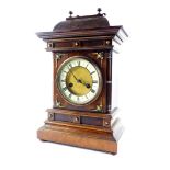 A German late 19thC oak and mahogany cased mantel clock, by the Hamburg American Clock Company,