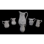 Six Portmeirion Heritage Collection parian relief moulded jugs, printed and raised marks, 9-, 22cm