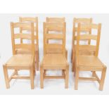 A set of six light beech ladder back single dining chairs, with solid seats, raised on square