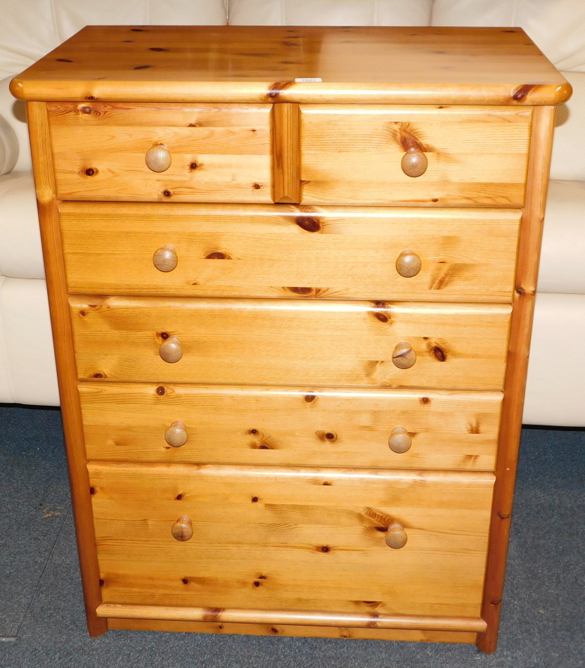 A pine chest, of two over four drawers, raised on a plinth base, 107cm high, 82cm wide, 49cm deep.