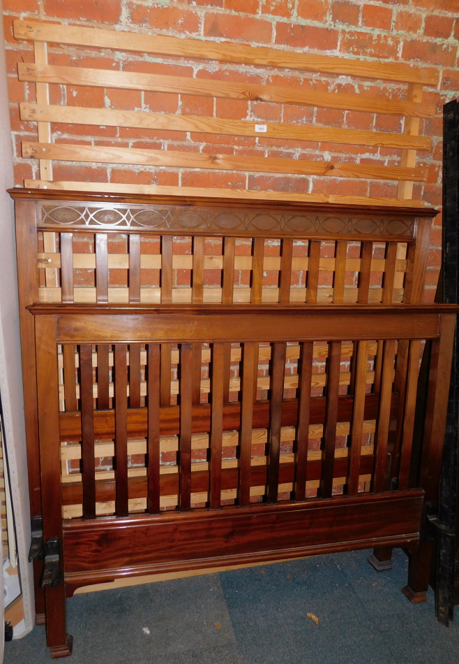 An Edwardian mahogany double bed frame, 144cm high.