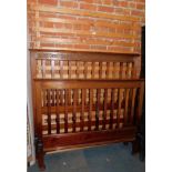 An Edwardian mahogany double bed frame, 144cm high.