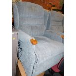 An electric rise and recline armchair, upholstered in a blue grey fabric