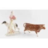A Beswick figure of a Limousin cow, 1996, boxed, (AF)., together with a Katzhutte Art Deco figure of