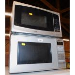 A silver Panasonic microwave, model no NNE281MM, together with a silver Logik microwave, model no