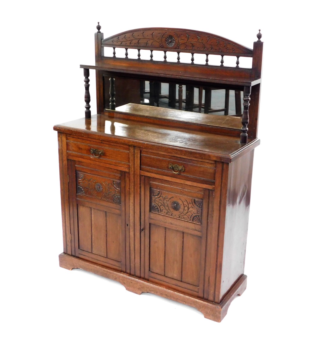 A Victorian mahogany chiffonier, the mirrored back with single shelf raised on turned supports, over