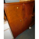 An early 20thC walnut and inlaid gentleman's wardrobe, 116cm high, 84cm wide, 46cm deep.