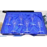 A set of six Royal Doulton crystal wine glasses, boxed.
