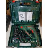 A Bosch rotary hammer drill, PBH2000RE, cased with instructions.