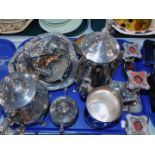 Plated wares, including a four piece tea set, candelabrum, cup holders and trinkets. (1 tray)