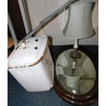 A white enamel bread bin, together with a Victorian oak oval framed wall mirror inset bevelled