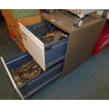 A Triumph metal two drawer filing cabinet, containing assorted tools.