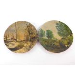 A pair of Watcombe late 19thC terracotta plates, painted with a harvesting scene and winter