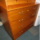 A teak chest of two over three drawers, with brass swan neck handles, stamped A C to rear 1963, 85cm