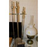 An Aladdin 23 brass oil lamp, with chimney and white glass shade, together with a set of fire