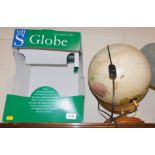 A W H Smith's illuminated globe, boxed.