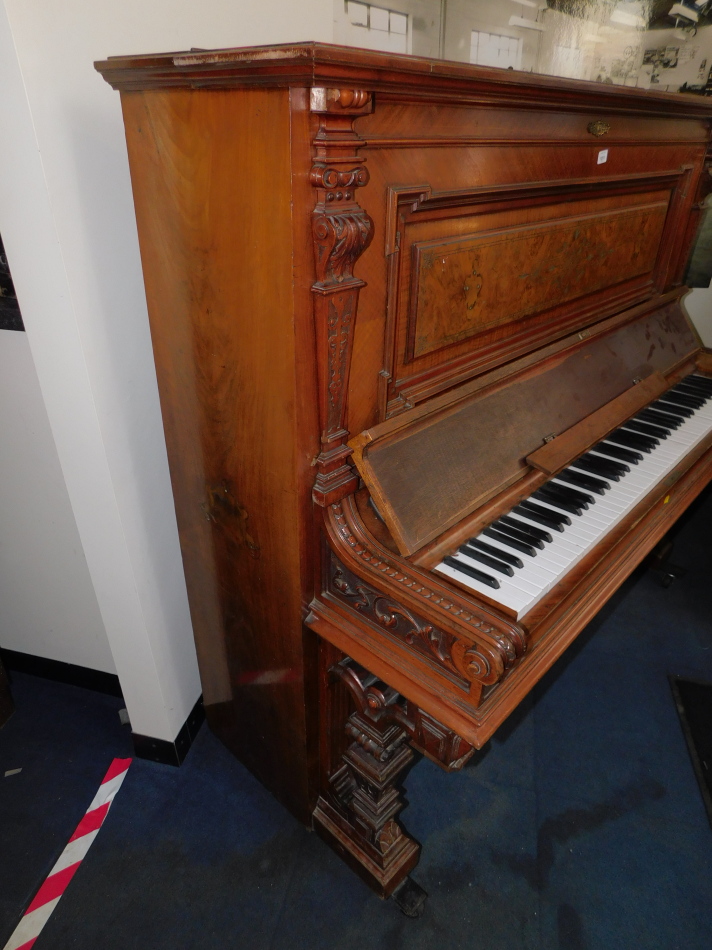 A Victorian walnut cased upright piano, makers label lacking, with carved pilasters, memorial plaque - Image 2 of 3