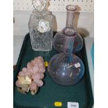 A pair of Victorian lilac coloured glass decanters, pink marble bunch of grapes and a cut glass
