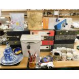 Assorted stationery and ceramics, to include two waste paper bins, various box files, a Partners