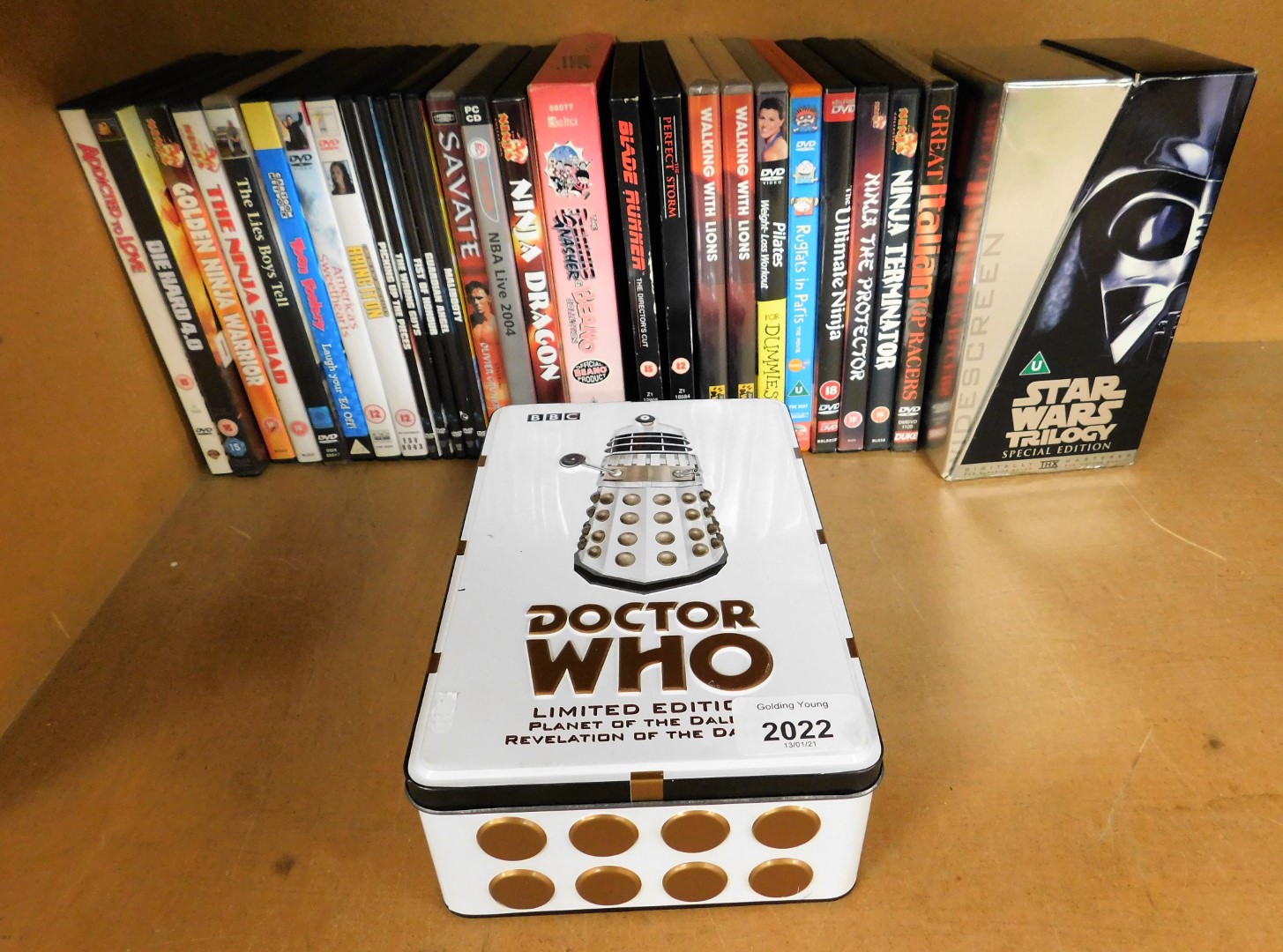 A quantity of DVDs and videos, to include Star Wars Trilogy Special Edition, A Doctor Who limited