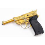 A James Bond Lonestar automatic cap gun, in gold with black handle.