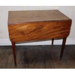 A George III mahogany Pembroke table, with frieze drawer, square tapering legs and brass castors,