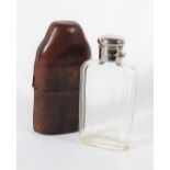 A Victorian cut glass flask, with silver plated bayonet cap, in a leather case.