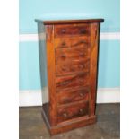 A William IV rosewood Wellington chest, with a plain top above seven graduated drawers each with