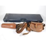 A leather cartridge bag by Payne Galwey, a leather cartridge belt and a pair of leather gaiters, a