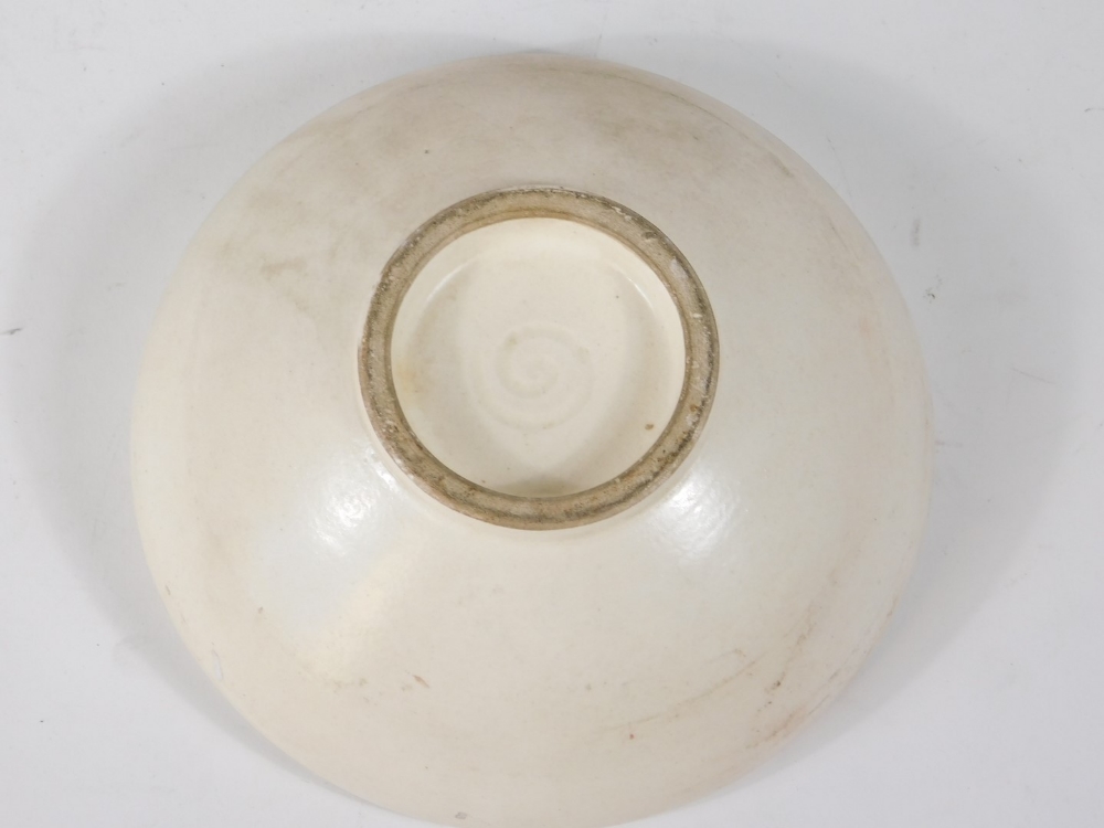 A Japanese Satsuma bowl, decorated with figures, vases in an interior scene, swirl mark to base, - Image 3 of 3