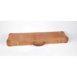 A Churchill Limited canvas and leather bound gun case, bears the name of Commander A Penrice-
