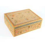 A Regency rolled paper scroll workbox, the hinged lid and sides decorated with sprigs of flowers,