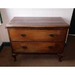 A late Victorian mahogany two drawer chest, with brass solid back plate handles and cabriole legs,