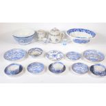 A group of blue and white ceramics.