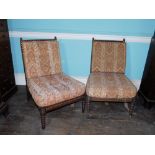 A pair of early Victorian rosewood bobbin turned sidechairs, each with a loose fitted padded