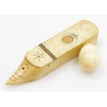 An 18thC ivory needle case in the form of a miniature shoe, with a gold hinge and pique work