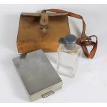 A vintage glass hunting flask by Harrods, with silver plated bayonet cap and sandwich box, contained