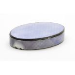 A George V oval silver snuff box, with lilac guilloche enamelled case, hinged lid and silver gilt