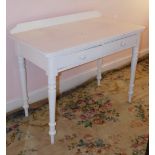 A Victorian painted side table, with two drawers, knop handles and turned legs, 107cm wide.
