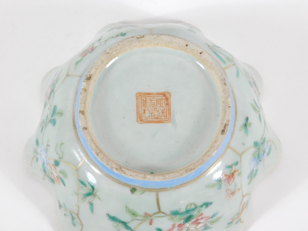 A 19thC celadon glazed Chinese porcelain bowl enamelled with peony branches, with wavy edge and - Image 4 of 4