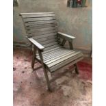Withdrawn Pre-Sale by Vendor. A slated oak garden chair.