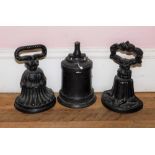 Three early 19thC cast iron door porters.