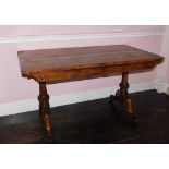 An early Victorian rosewood library table by Holland & Sons