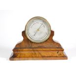 A Victorian drum head walnut and gilt brass mantel aneroid barometer, by Millard & Son of London,