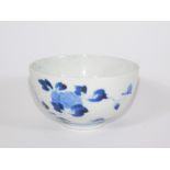 A 19thC Chinese blue and white porcelain bowl, decorated with flowers, six character mark to base,
