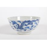 A late 19thC Chinese blue and white porcelain bowl, with four claw celestial dragon and four
