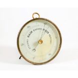 A mid 20thC brass cased table aneroid barometer, with ring handle/hanger, 15cm high.