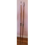A Stuart Homer archery longbow, *48*28, circa 1992, 182cm, and another similar bow 187cm.
