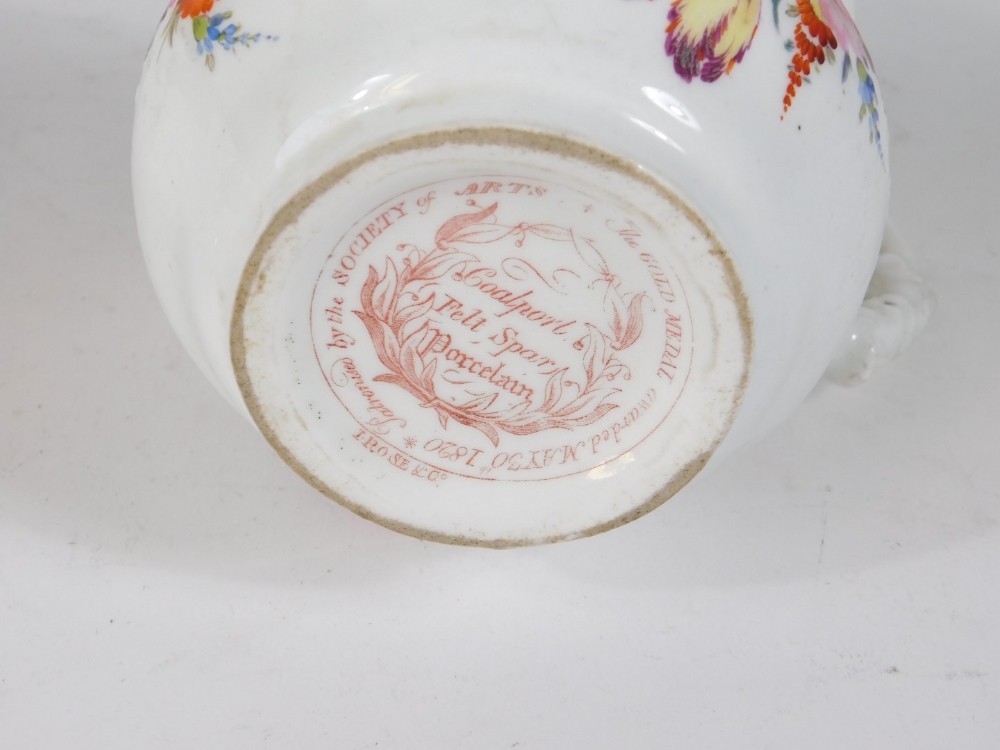 A Coalport felspar cream jug, decorated with floral sprays on a C scroll moulded body and 12cm - Image 3 of 3