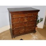 A late 17th/early 18thC oak chest of drawers, the planked top with a moulded edge, above four